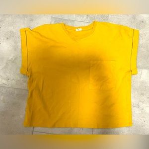 Cropped short sleeved shirt with front pocket from Oysho